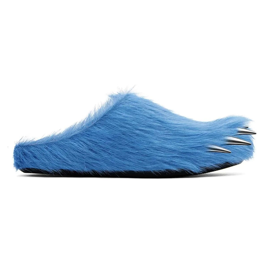 Bravest Studio blue faux fur Bear Claw Mule with three silver pointy claws extending from the toe.