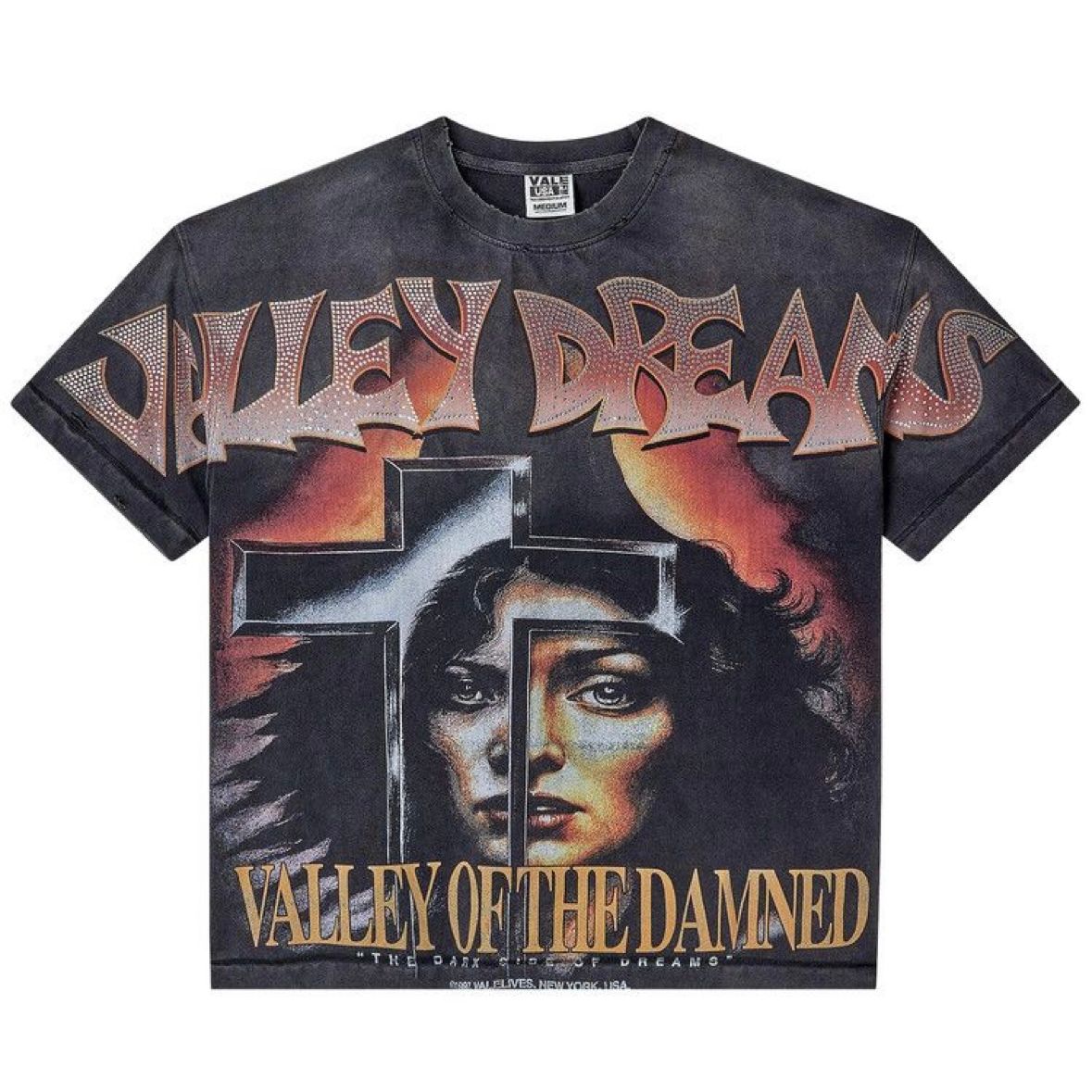Washed black tee. "VALLEY DREAMS" ombre text with silver bling. Graphic: woman's face split by a white cross, red sun. "VALLEY OF THE DAMNED" text.