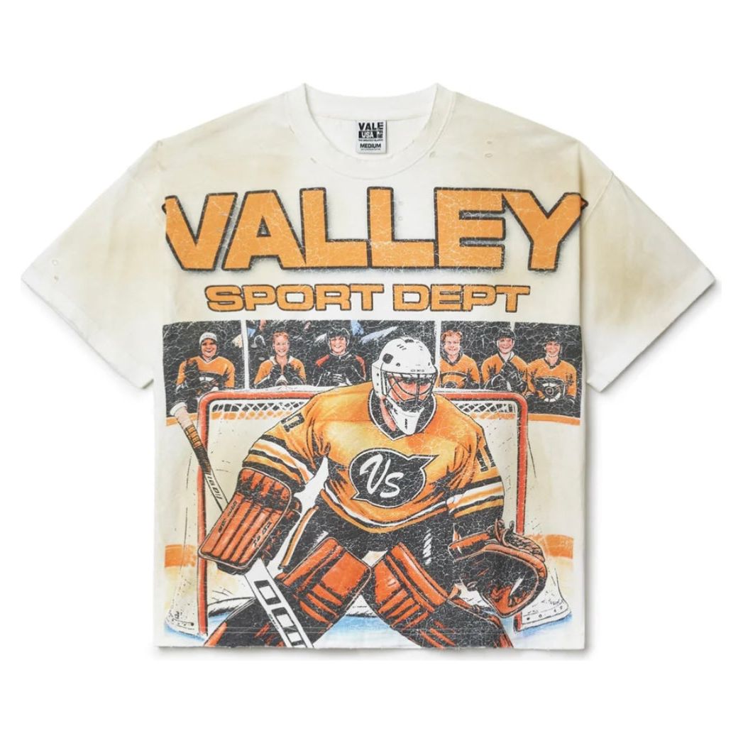 Vale Forever white distressed tee with vintage hockey graphic: 'VALLEY SPORT DEPT' & a goalie in orange/yellow 'VS' jersey.