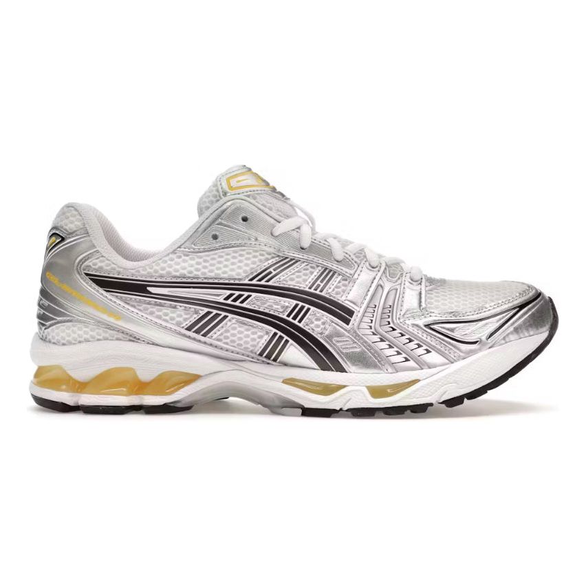 ASICS Gel-Kayano 14 Tai Chi sneaker. Silver/white mesh with metallic silver overlays, black logo stripes, and gold gel accents.