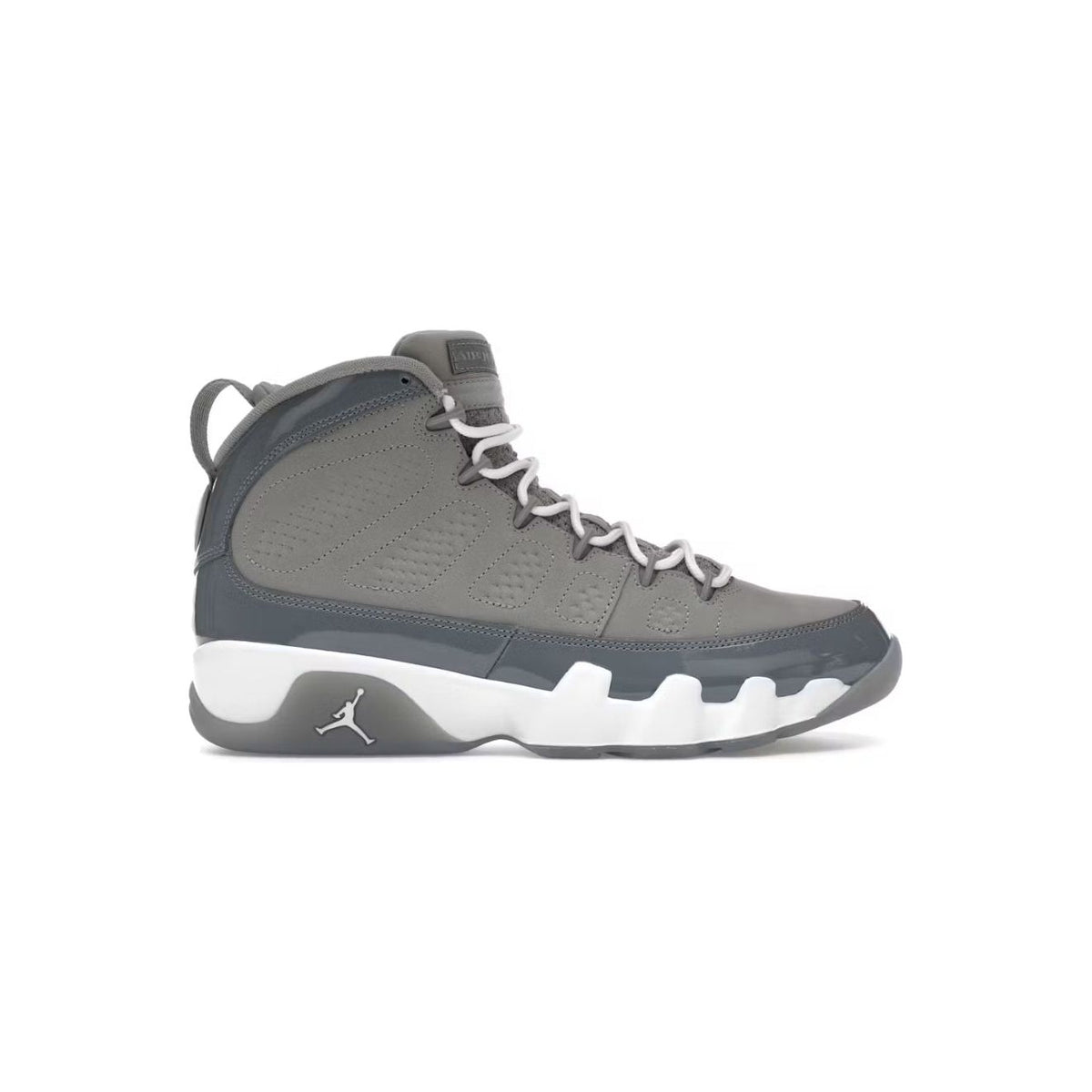 Air Jordan 9 Retro Cool Grey sneaker. Medium grey upper, dark grey patent leather mudguard, white laces and sole with Jumpman.