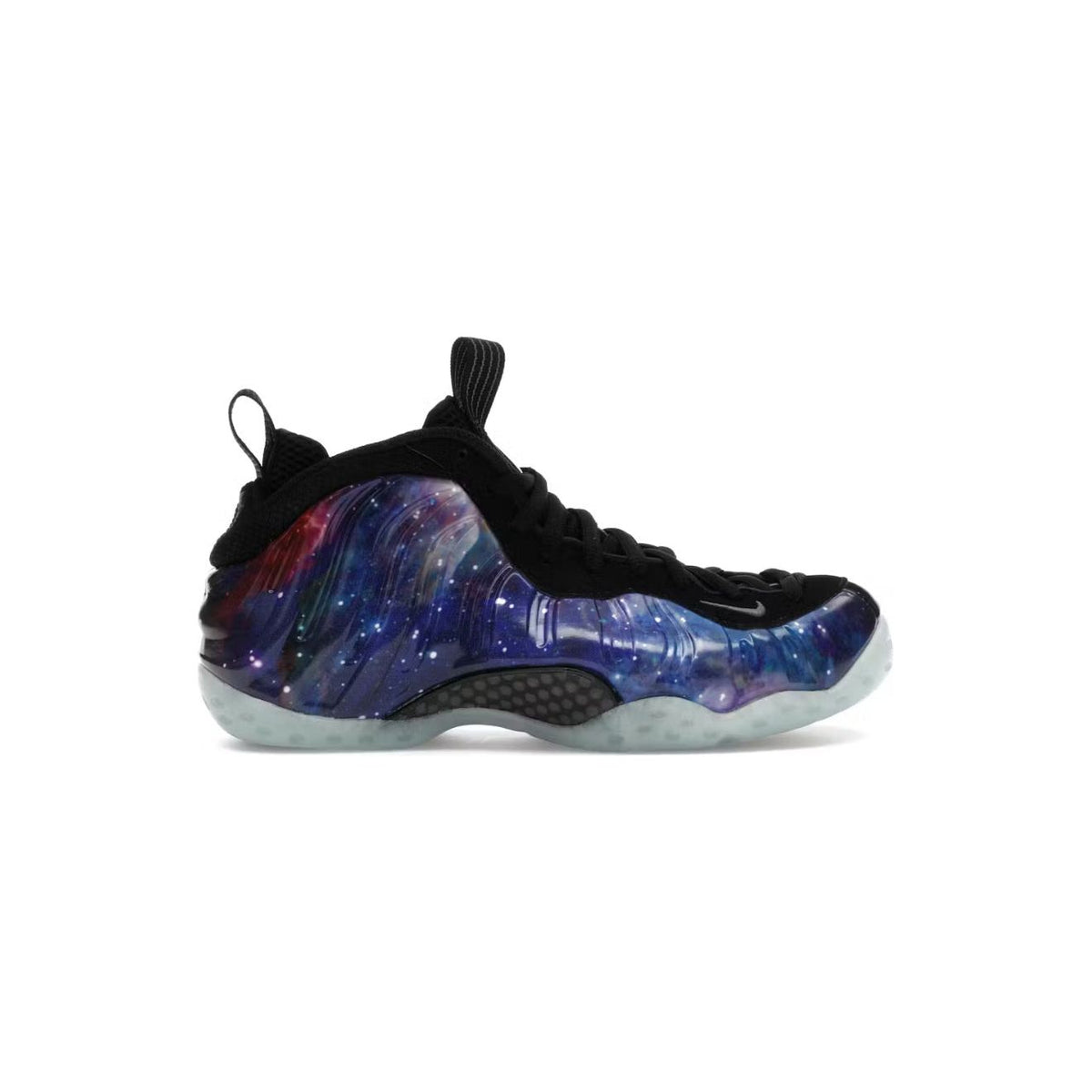 NIKE Air Foamposite One 'Galaxy' sneaker: vibrant purple & blue nebula shell with white stars, black trim, translucent sole.