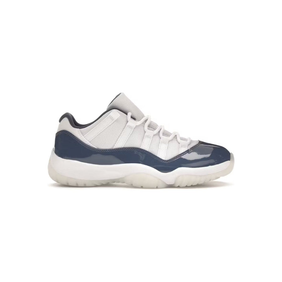 Air Jordan 11 Low sneaker with white mesh upper, diffused blue patent leather mudguard, white laces, and translucent sole.