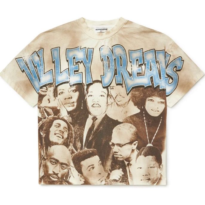 Vale Forever Rushmore Tee: Distressed cream tee with blue "VALLEY DREAMS" text & sepia portraits of MLK, Malcolm X, Bob Marley.