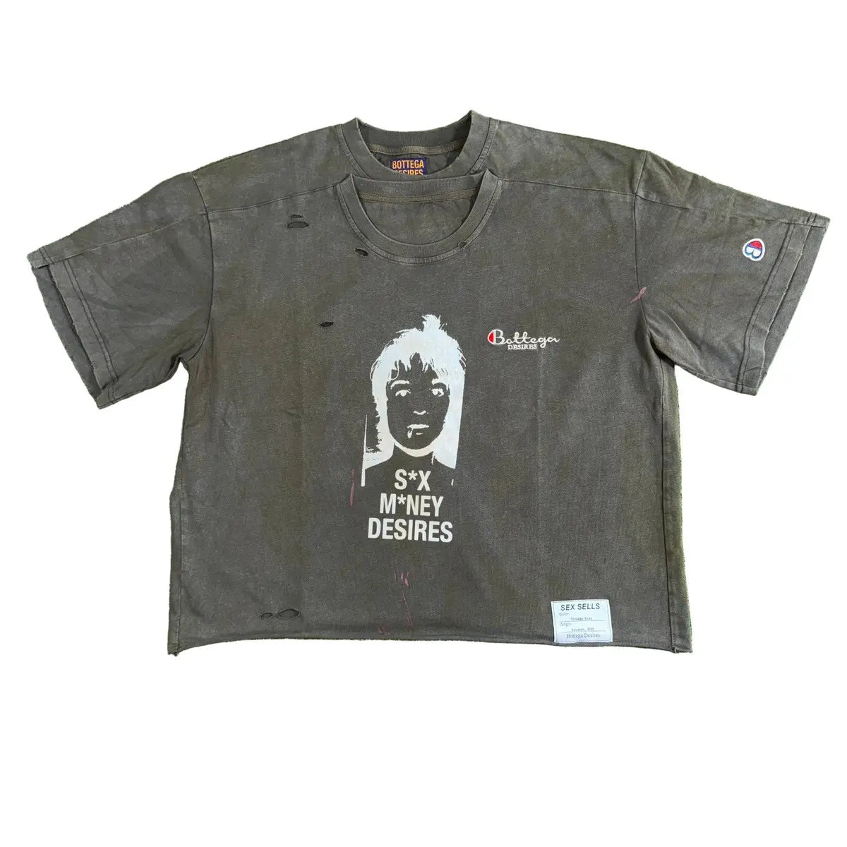 Bottega Desires vintage gray distressed tee, 'Sex Sells' tag. White face graphic with 'S*X M*NEY DESIRES' text. Red Bottega logo.