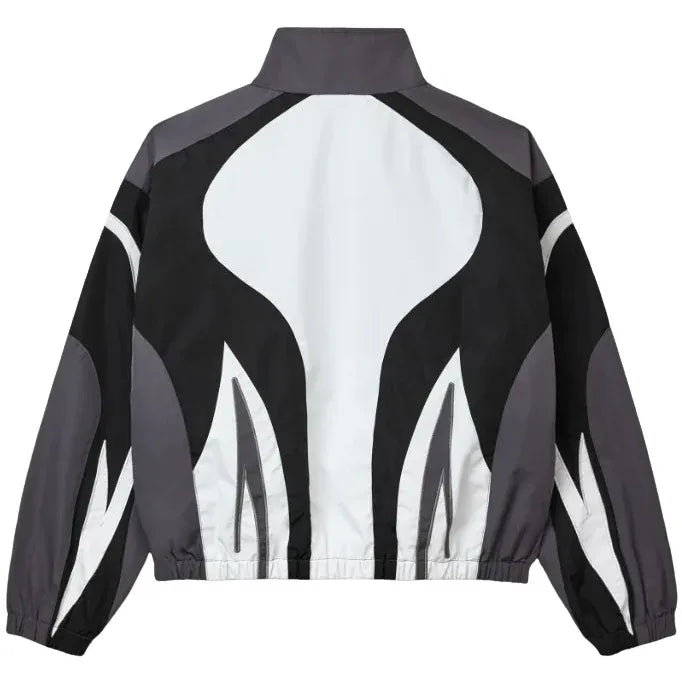Vale Forever Mono Track Jacket. Black with white & gray abstract geometric panels on the back. Stand collar, elastic hem.