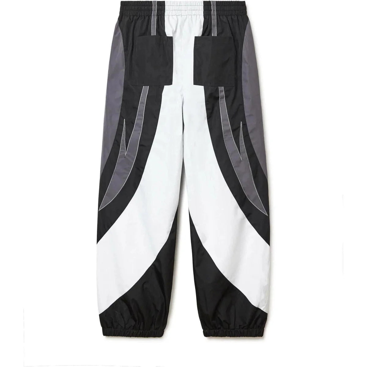 Vale Forever Mono Track Pants. Black, white & grey color block with reflective wavy lines, front pockets, elastic waist & cuffs.