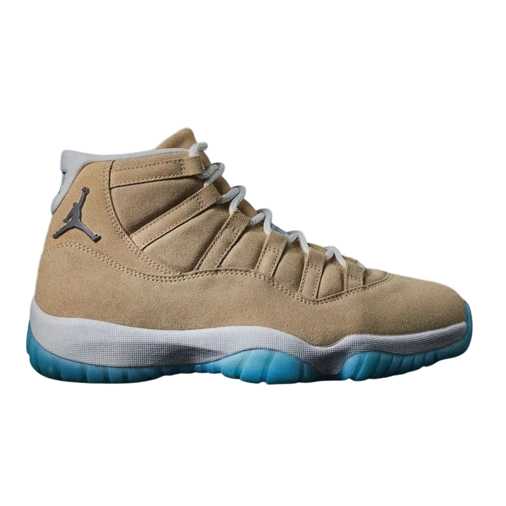 Air Jordan 11 Retro 'H-Town' high-top in tan suede, white midsole, and light blue translucent outsole. Jumpman on heel.