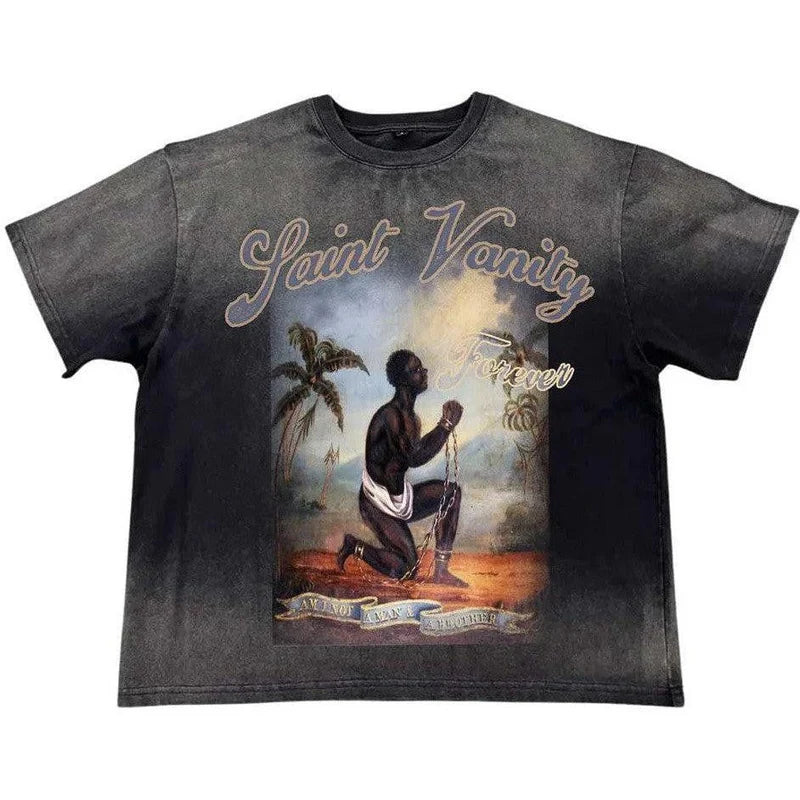 Dark grey Saint Vanity BHM 2.0 Tee with graphic of chained kneeling enslaved man, 'Saint Vanity Forever' & 'Am I Not A Man & A Brother'.