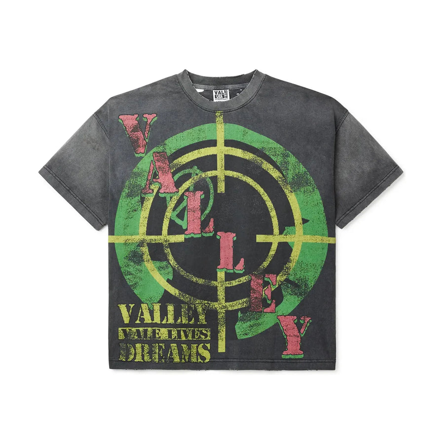 Vale Forever Target Tee. Faded black oversized t-shirt with a green & yellow target graphic. Red "VALLEY" & yellow "VALLEY VALE LIVES DREAMS" text.