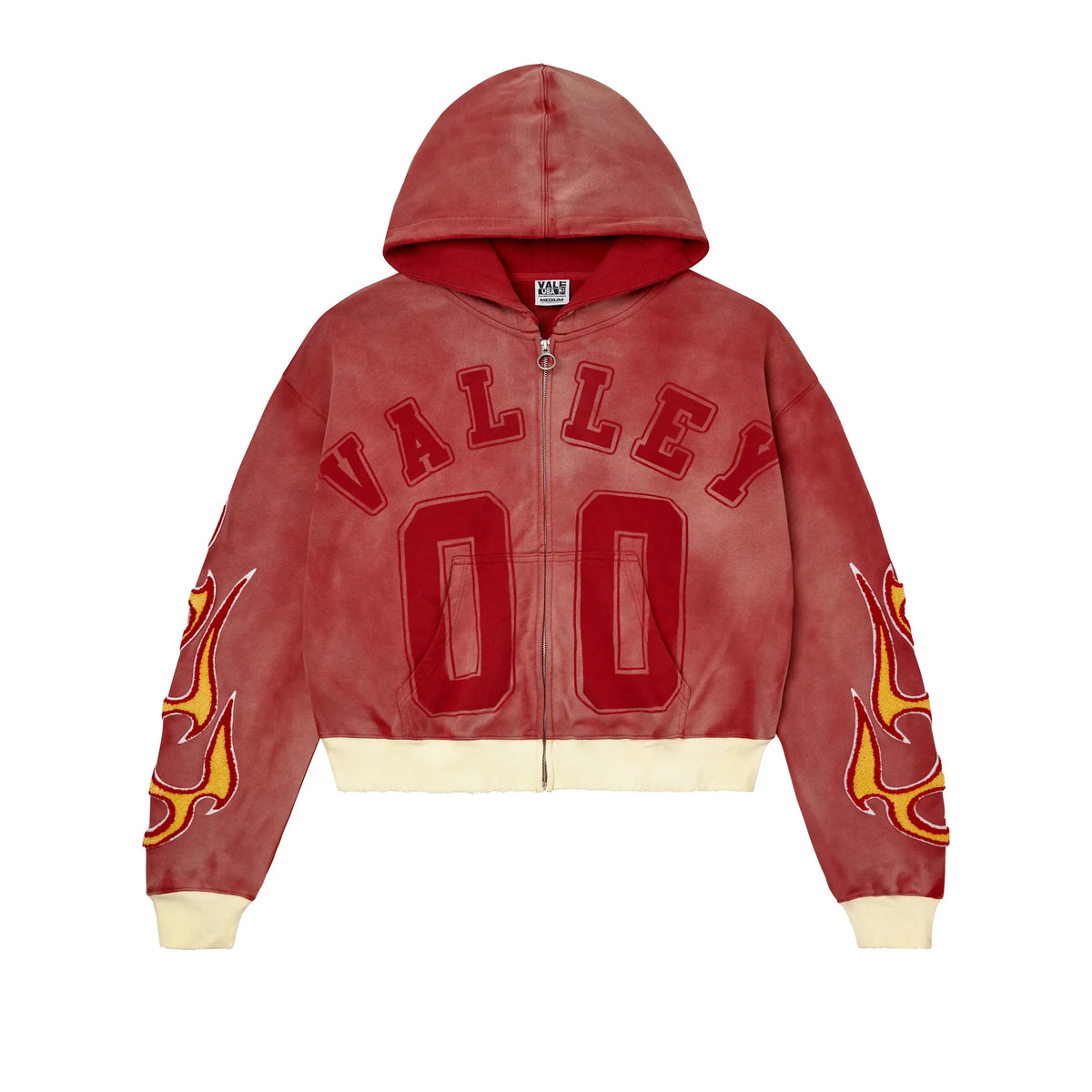Distressed red Vale USA zip-up hoodie. "VALLEY 00" in red on chest, yellow & red flame appliques on sleeves, cream ribbed cuffs/hem.