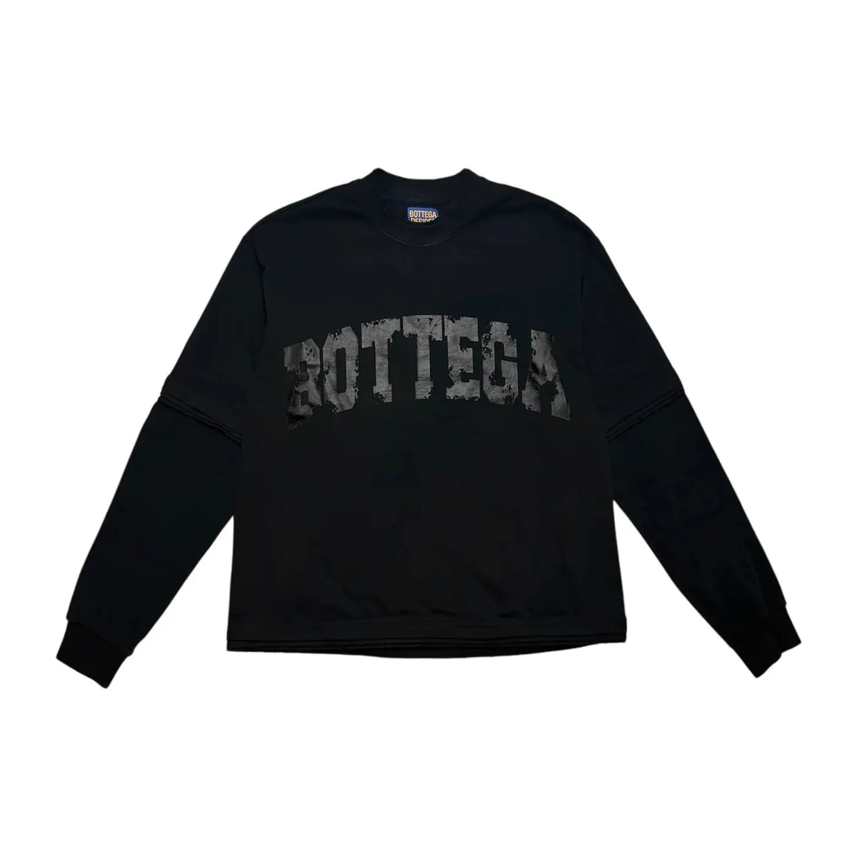 Black thermal long sleeve tee with distressed gray-black "BOTTEGA" text on front. Crew neck, Bottega Desires label.