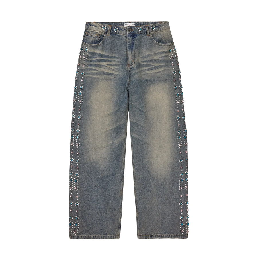 Vale Forever Candy Denim. Faded blue, straight leg jeans with pink, blue, & clear rhinestones & studs along outer seams.