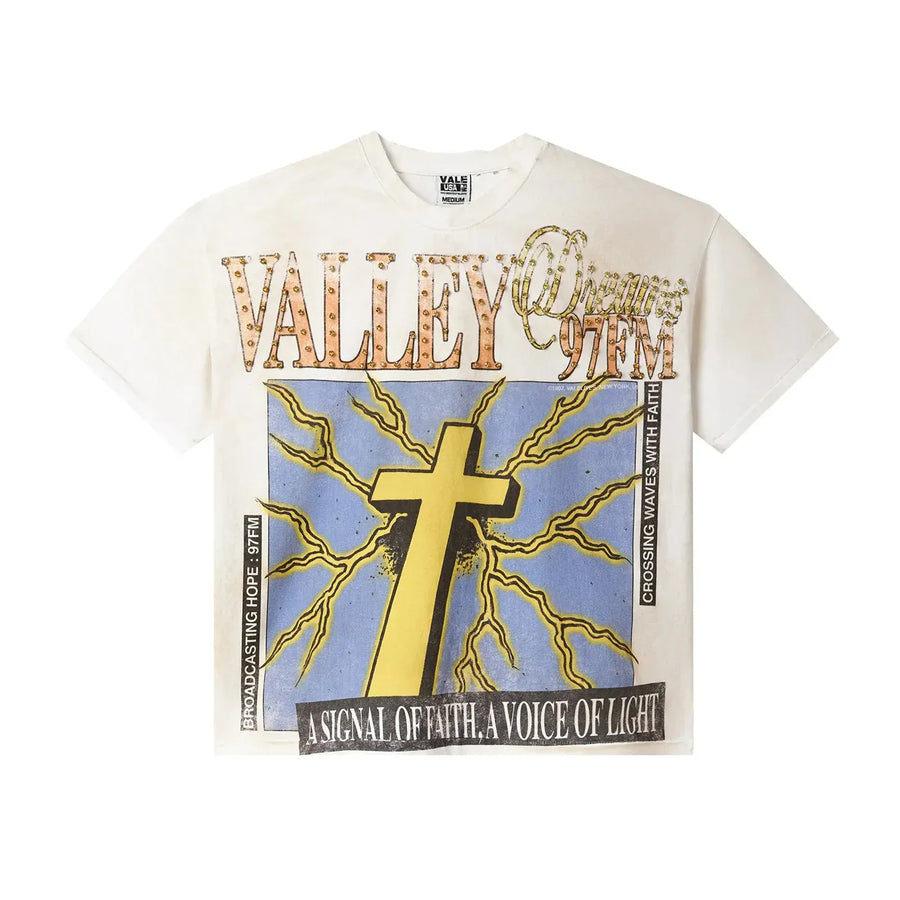 Cream Vale USA tee. Features "VALLEY Dreams 97FM" in bling text, yellow cross with lightning on blue background.