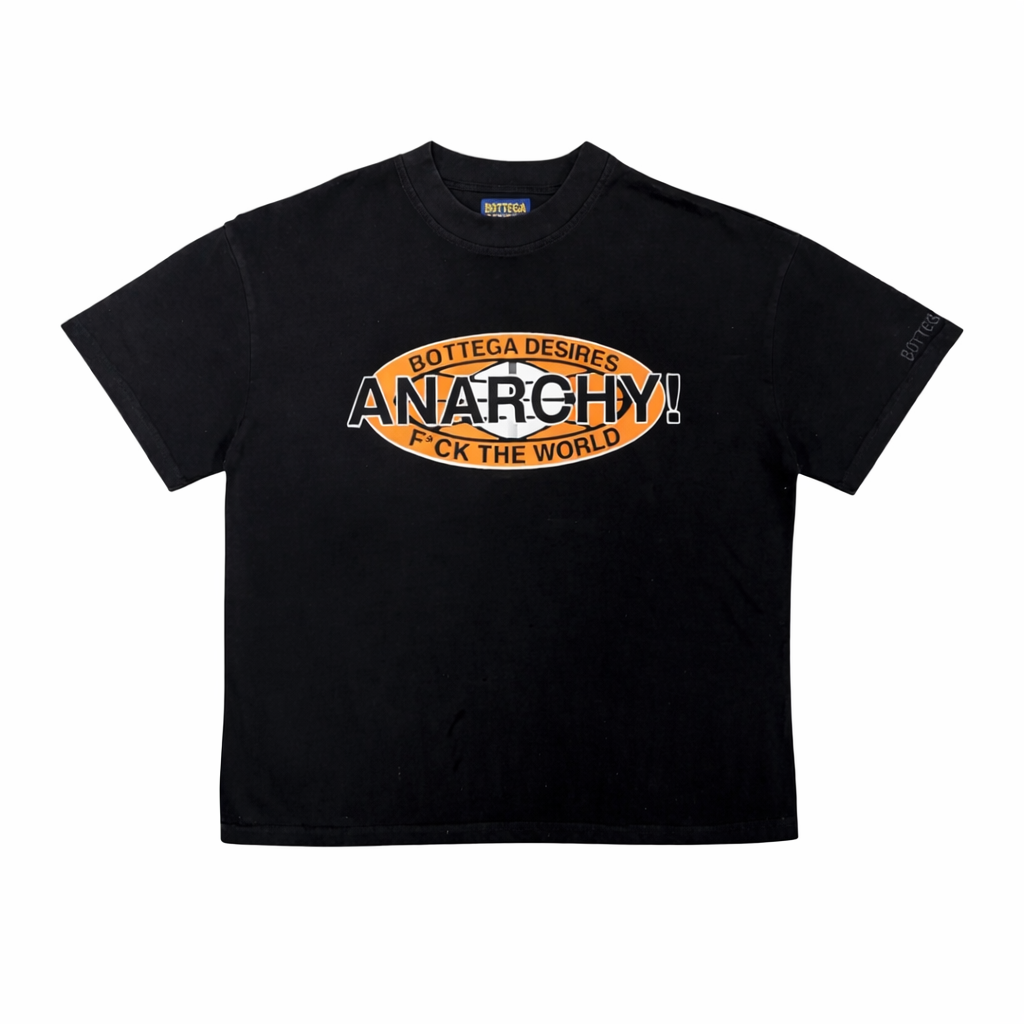 Black Bottega Desires Anarchy tee with front orange oval graphic reading 'Bottega Desires ANARCHY! F*CK THE WORLD'.