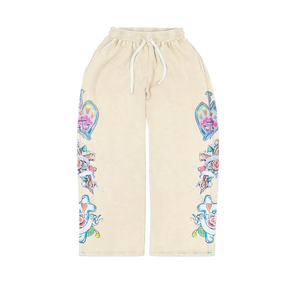 Cream sweatpants with white drawstring. Vibrant tattoo-style hearts, crosses, nails, & roses decorate both legs.