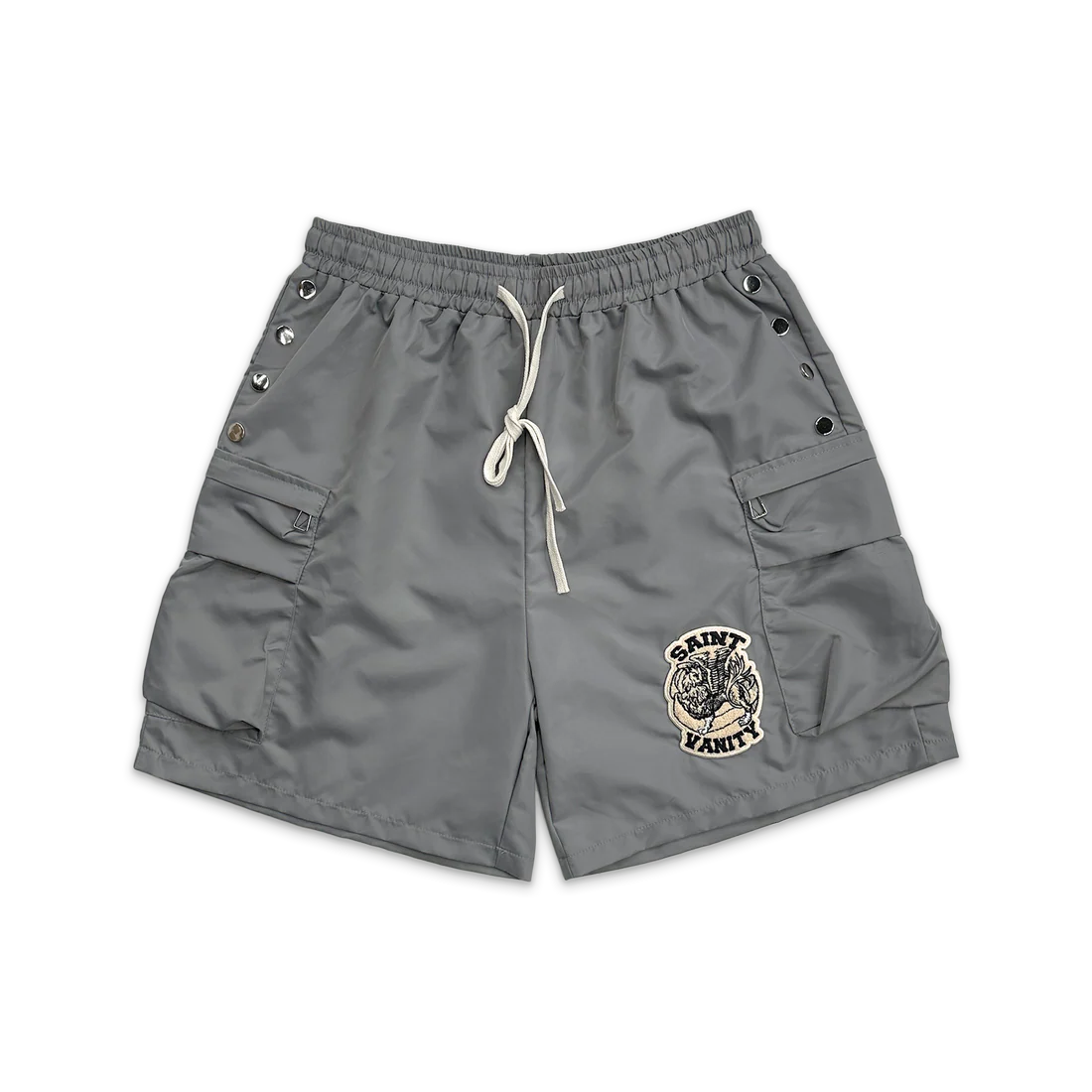 Grey Saint Vanity nylon cargo shorts with elastic waist, white drawstring, side snaps, and logo patch.