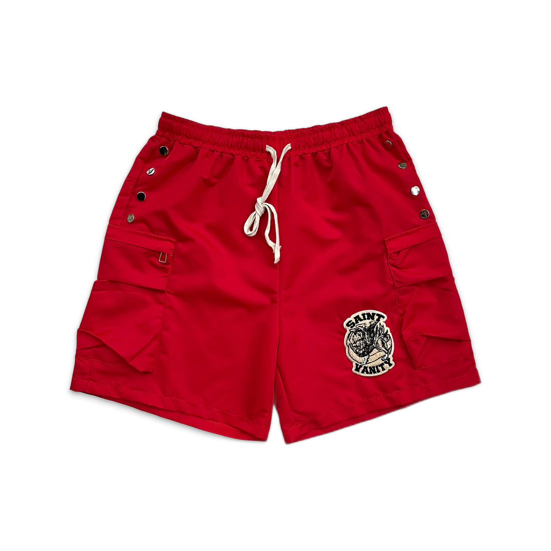 Saint Vanity red nylon cargo shorts. Elastic waist, white drawstring, side snaps, large cargo pockets, & logo patch.