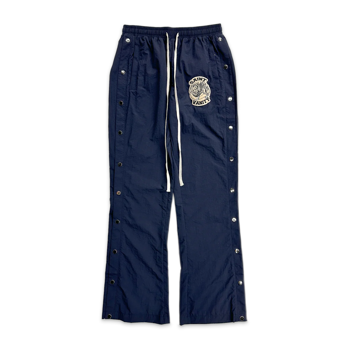 Navy Saint Vanity cargo nylon pants with elastic waist, white drawstring, side snap buttons, and a branded patch.