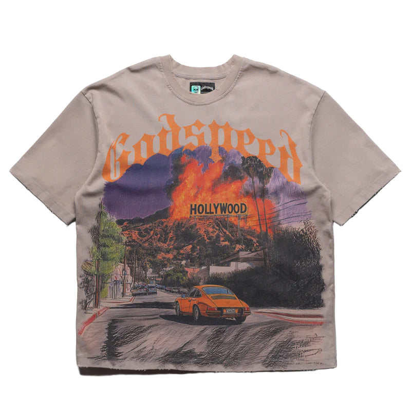 Godspeed stone wash tee with orange 'Godspeed' text. Graphic: burning Hollywood hills, 'HOLLYWOOD' sign, orange sports car.