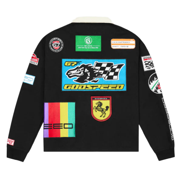 Black Godspeed GRC Quarter Zip Polo, white collar, colorful racing patches. Main blue patch: skeletal horse, checkered flag, 'GODSPEED'.
