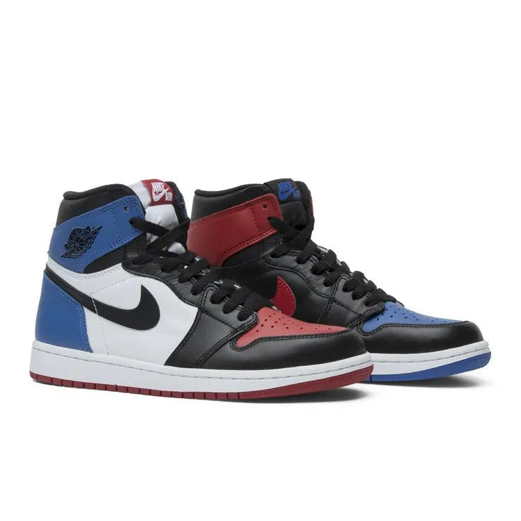 Pair of Air Jordan 1 High OG "Top 3" sneakers. One has blue collar/red toe, other has red collar/blue toe.