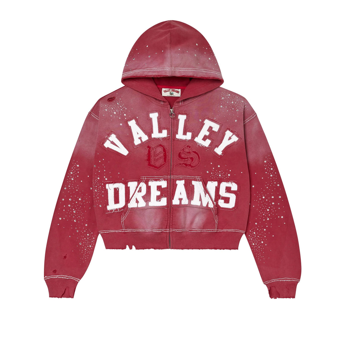 Distressed ruby zip-up hoodie with large white 'VALLEY DREAMS' appliqué, scattered rhinestones, and visible rips.