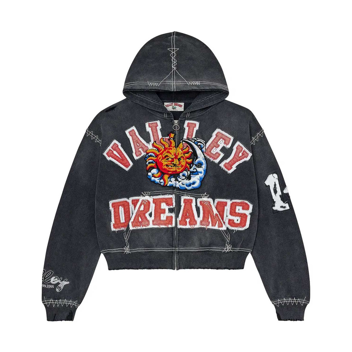 Black distressed zip-up hoodie with red "VALLEY DREAMS" text, sun/moon graphic, white stitching, & cropped style.
