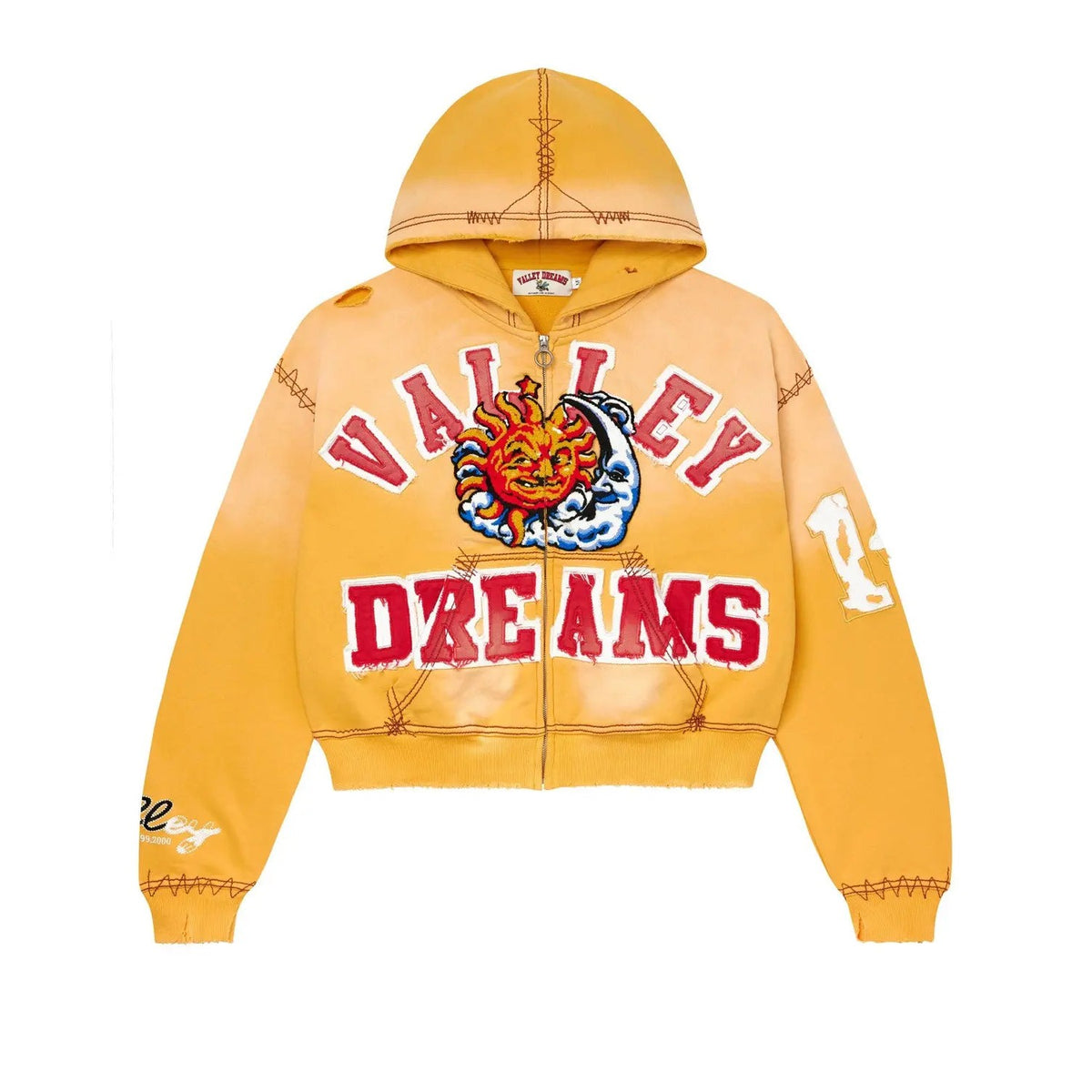 Sunny yellow cropped zip-up hoodie. Features red "VALLEY DREAMS" text with a sun/moon graphic, distressed details, and visible stitching.