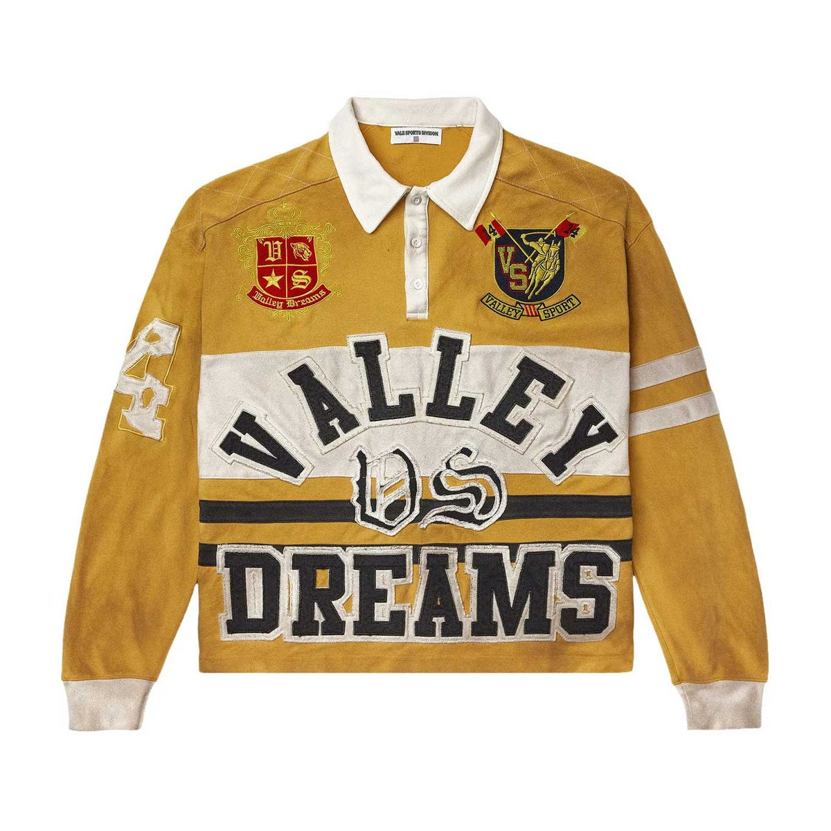 Mustard yellow L/S rugby polo. White collar, cuffs, chest & sleeve stripes. 'VALLEY DS DREAMS' patches, 2 crests.
