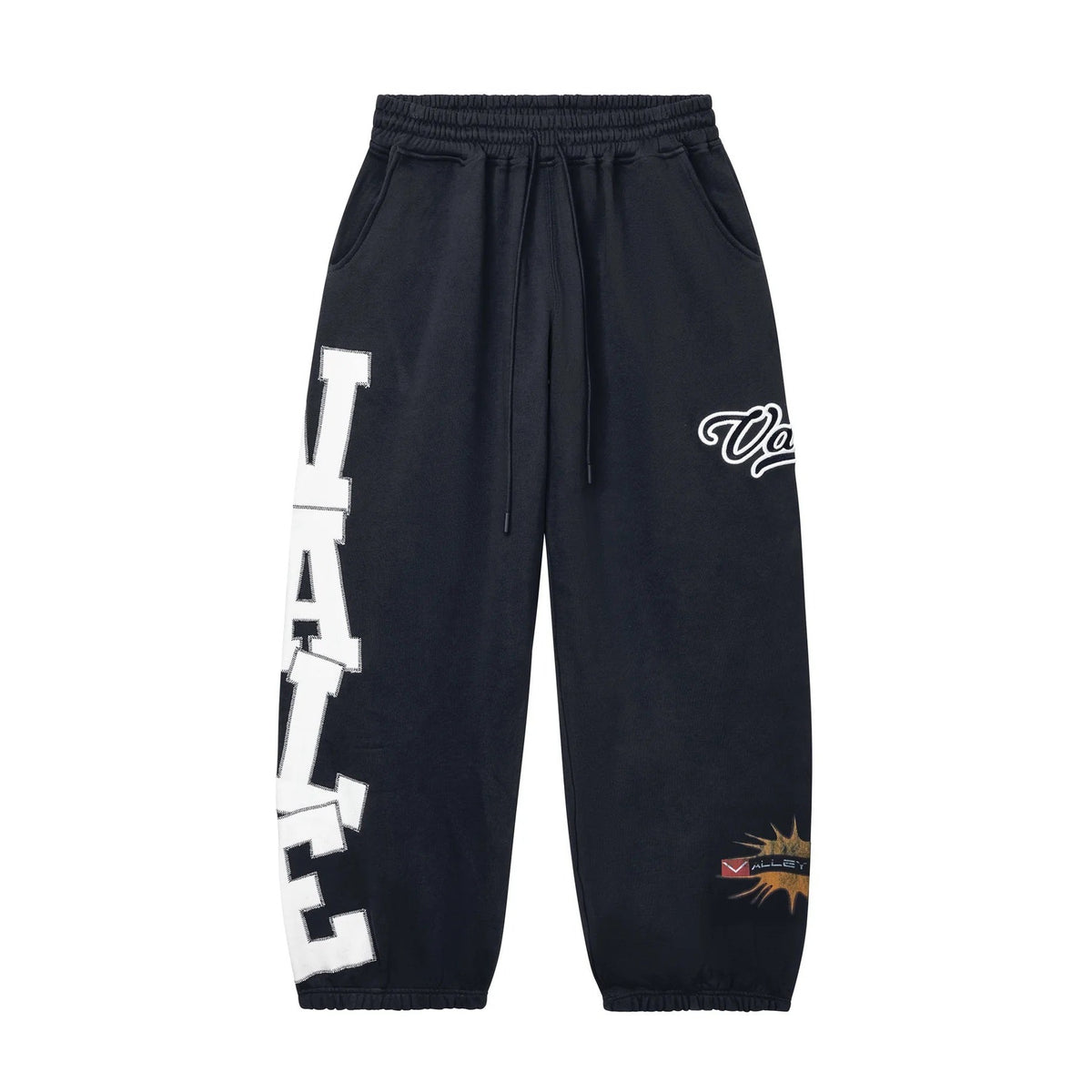 Black sweatpants with drawstring, pockets. Large white distressed VALE on left leg, Va script & MARKET graphic on right.